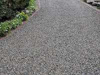 CORE Gravel grids retain the gravel and ends rutting and sinking on a gravel driveway. It is also weed free and allows for landscaping right up to the driveway's edge.